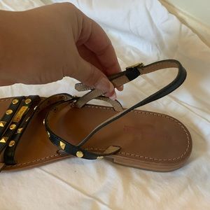 Les Tropeziennes Black and gold gladiator sandals